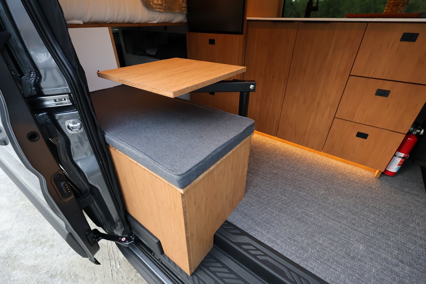 Passenger-side bench seat and table in the Aire layout