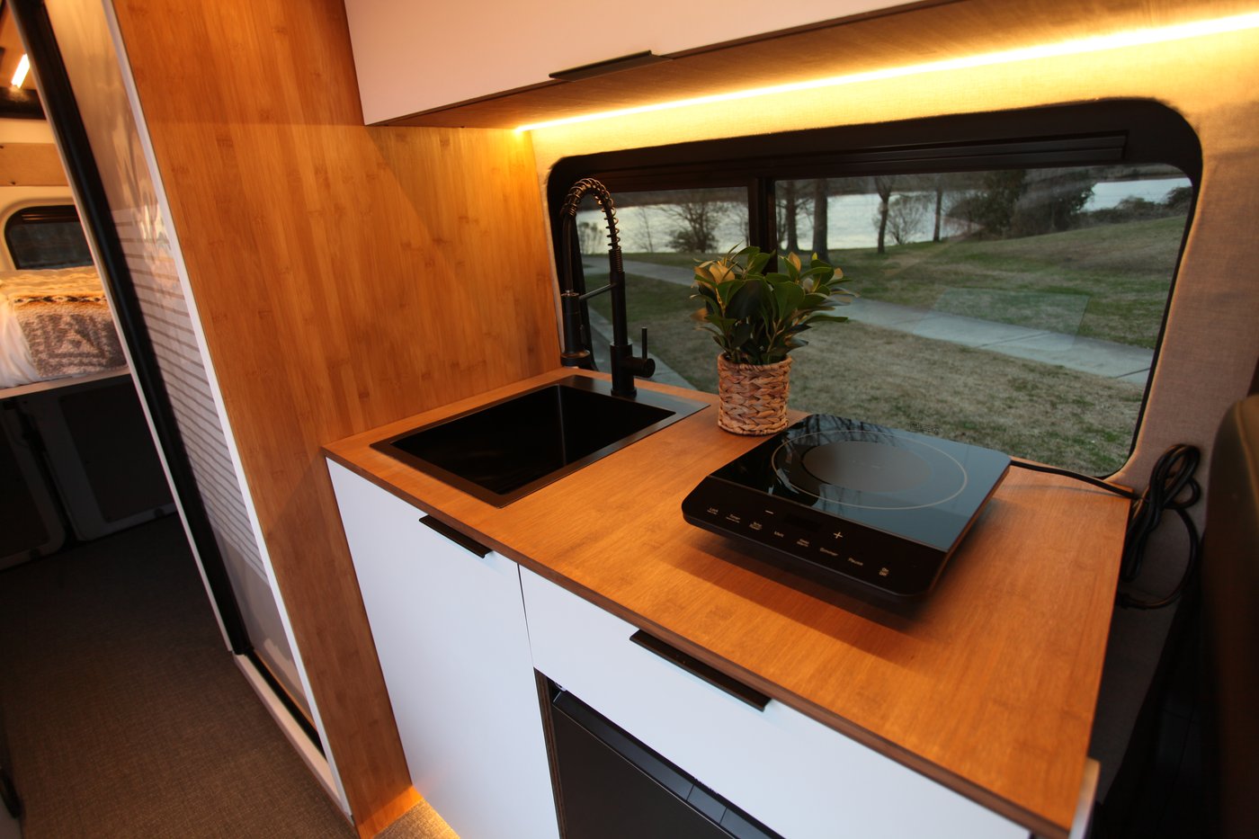 Atlas galley kitchen with sink and induction cooktop